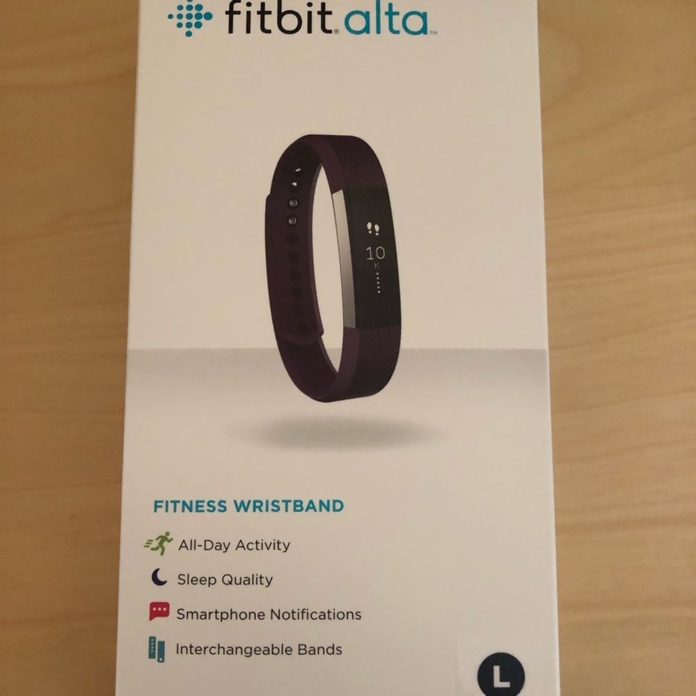 FITBIT ALTA PLUM  NEVER OPENED!